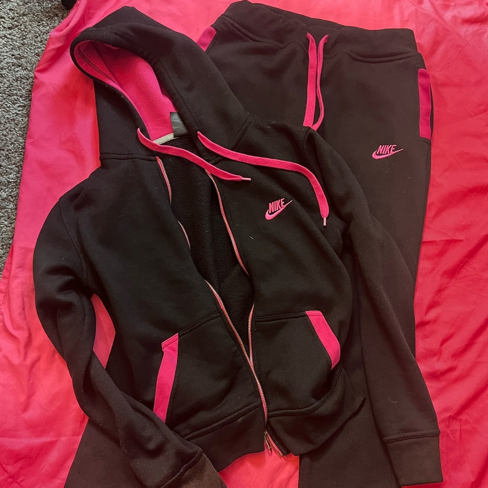 Small pink and black women’s nike tracksuit